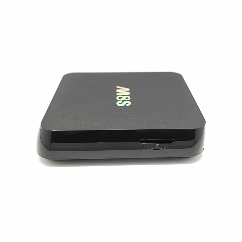 Vista lateral del Android TV Box 4K M8S mostrando puertos de conexión