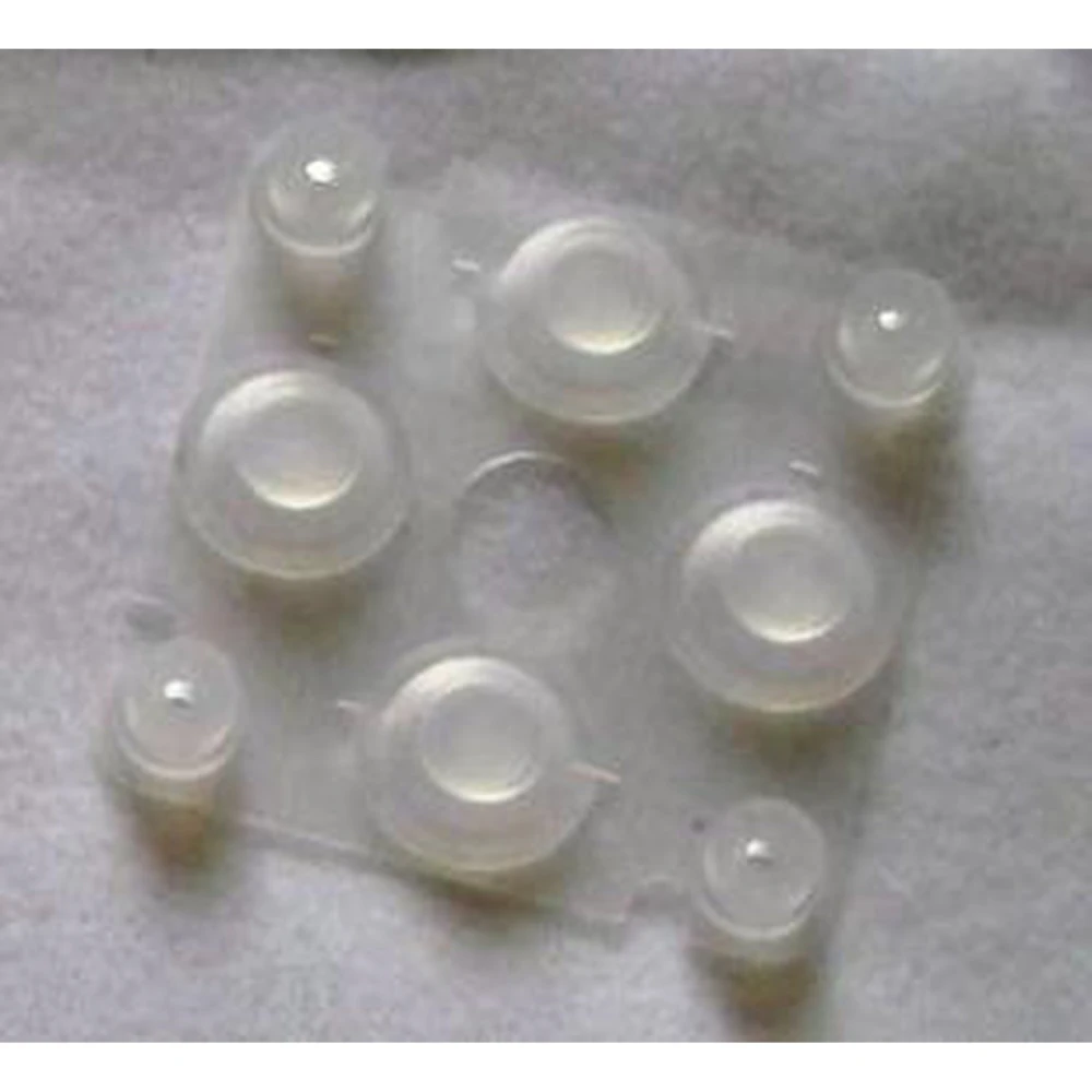 PSP2000 D-pad johtava kumiosa PSP 2000 -konsolin korjaukseen