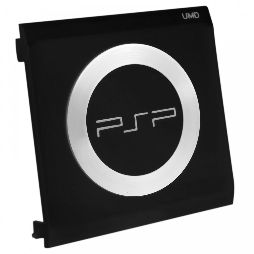 PSP UMD -levykansi metallirenkaalla ja kaiverruksella