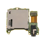 Nintendo Switch -kortinlukija kuulokeliitännällä ja kasettipaikalla